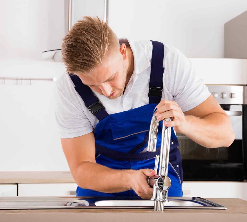 https://handyworkman.com/wp-content/uploads/2022/02/plumber-min.jpg